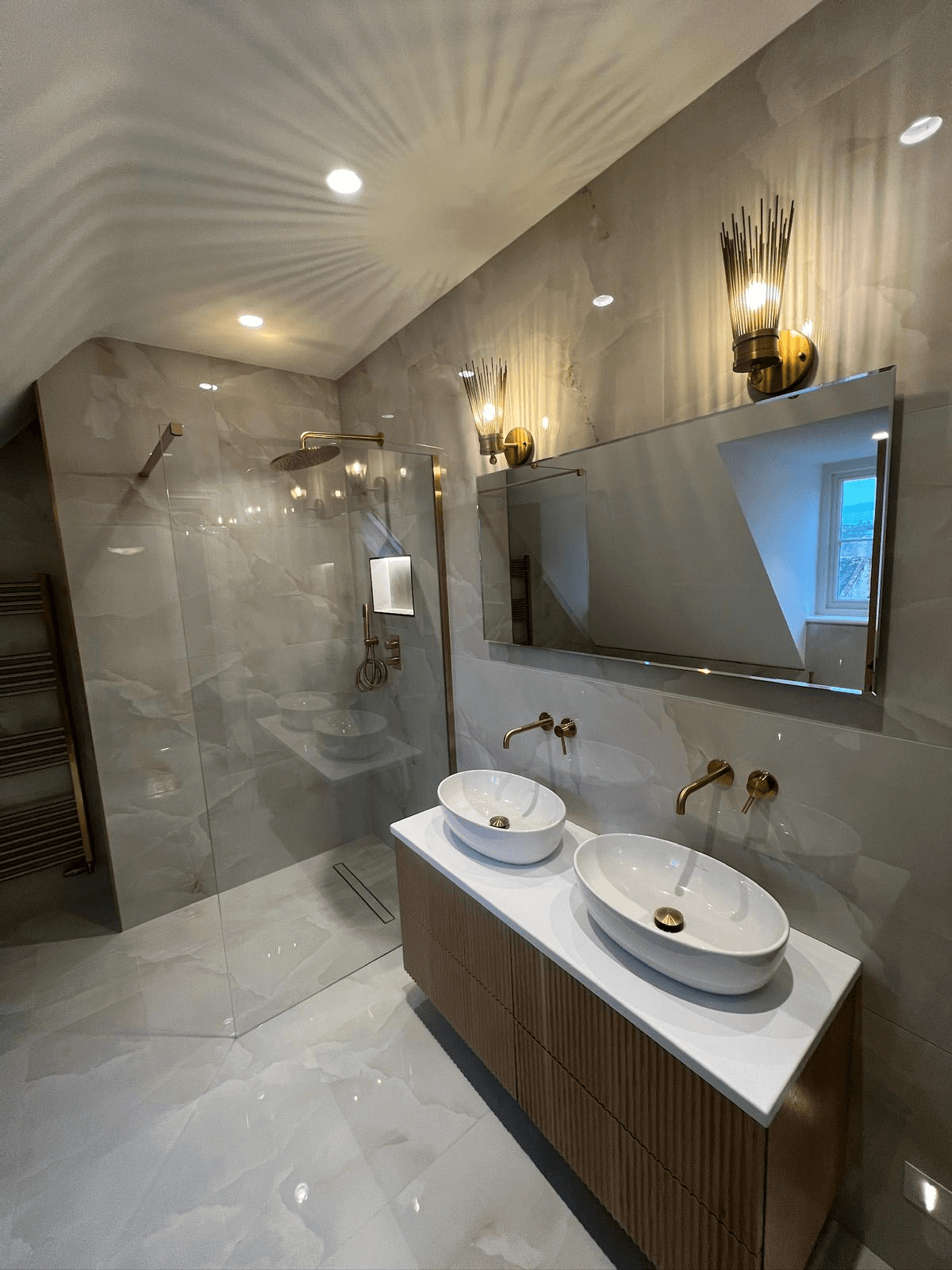 Elegant bathroom with walk-in shower and double vessel sinks